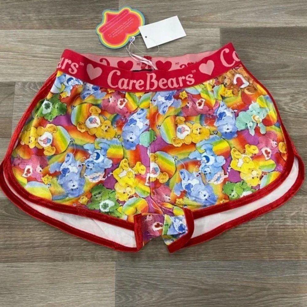 IRON FIST Care Bears Lotsa Rainbows red velvet trimmed dolphin shorts NWT